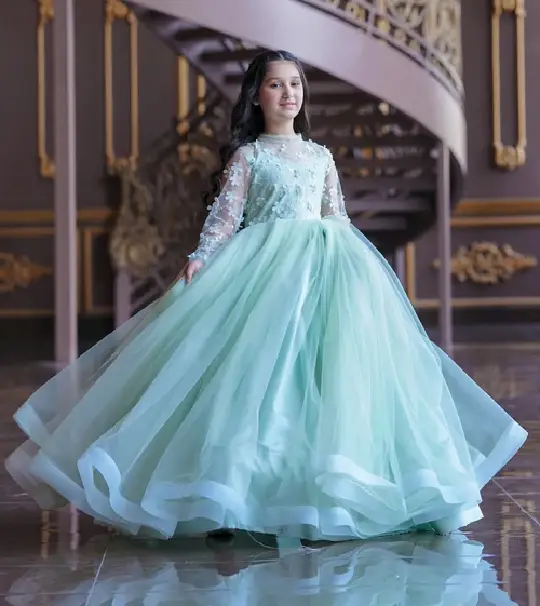 Emilia Mint Dream Gown for girls in mint green net fabric by Talia’s Belle